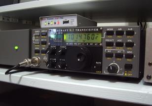 An Elecraft K2 HF transceiver used for HF packet, paired with an SCS Tracker DSP TNC.